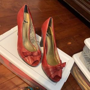 Red peep toe heels